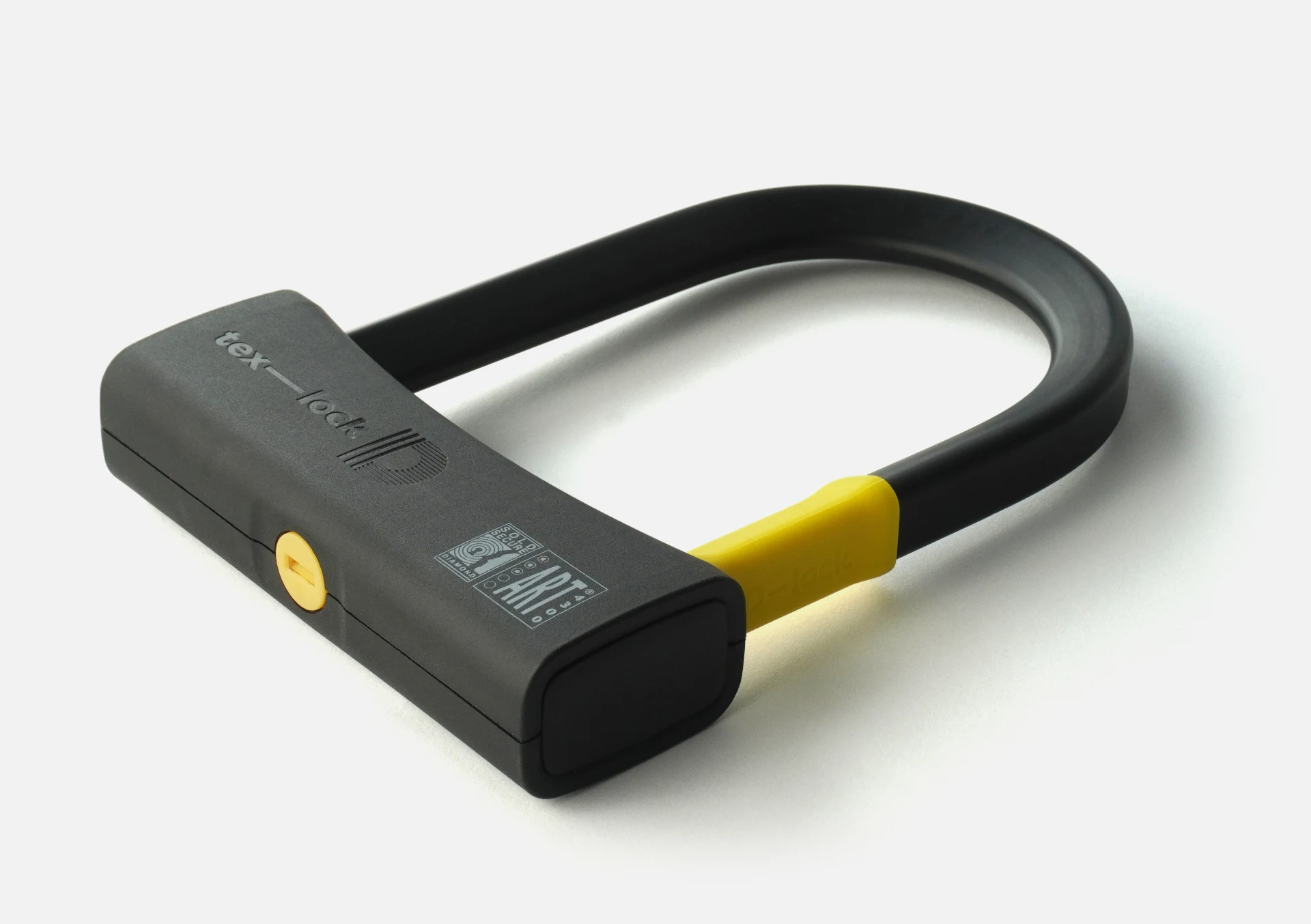D-lock Bügelschloss in schwarz-gelbem tex-lock Design vor weißem Hintergrund